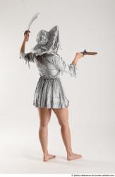 LUCI_AVIOL STANDING POSE WITH GUN AND SWORD 2